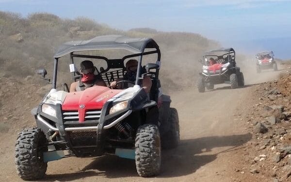 Tourists receiving safety instructions before their buggy tour in Agadir.