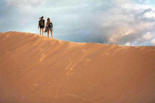 Sandboarding trip from Marrakech, with an exciting journey to Agadir's sand dunes for an unforgettable desert experience.