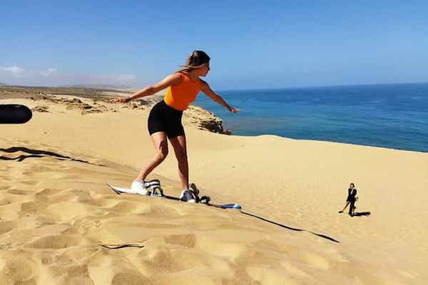 Sandboarding Marrakech tour adventure, with scenic views and thrilling rides on the dunes of Agadir.