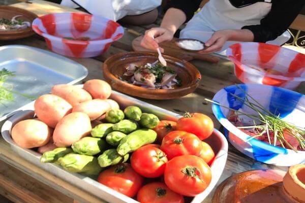 Cooking class in Taghazout featuring traditional Moroccan dishes